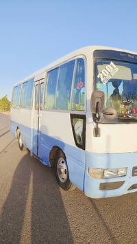 كوستر نيسان 2001 محرك كيه 3000 گير كيه مسكر  حصه كاز بيها رقم بغداد مش...