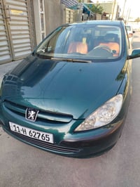 بيجو 307 مديل2005 باسمي مشروع وطني محرك2000 السيارة كلش نظيفة وبي نواق...