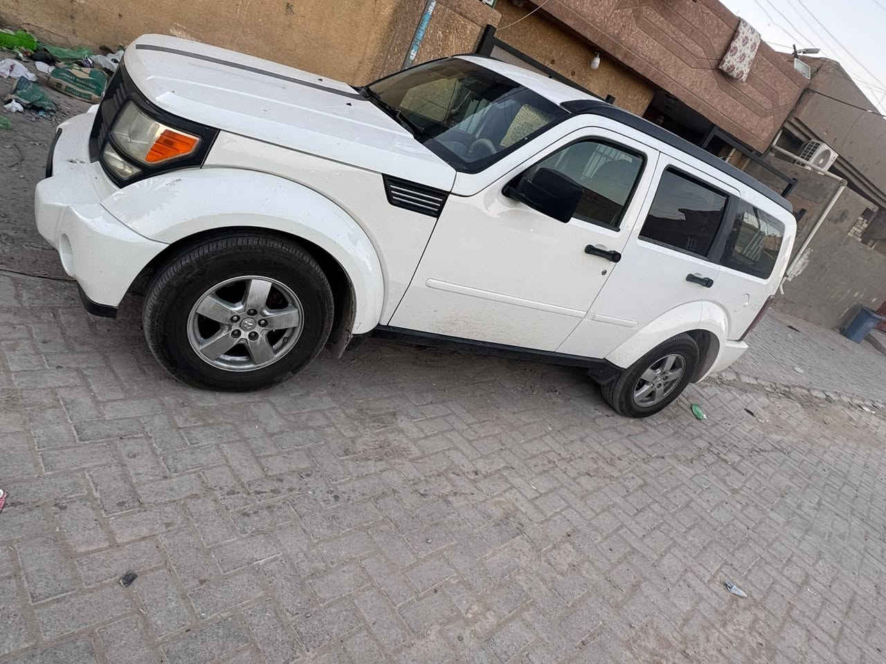 السلام عليكم دوج نترو 2009رقم بغداد باسمي رقم انكليزي  بغداد الزعفرانيه كير محرك حداده تبريد كولها جديده زنون  شاشه كامره خلفيه  دوشمه كشنات وارضيه تخم تاير جديد باتري جديد سقف كنتاره معه روز رايز حقيقي الف حبه بيها 200حركه ولون  اناره داخليه اربع بوب معه اناره ارضيه  بيها 3قطع صبغ بنيد لئن جارد وباب السائق والجاملغ بدون دواخل فقط صبغ حادثها بامريكا  سيارة حلوه جدا تو ويل  بيها فتحه فيت بم ملاحضه السياره متعوب عليها متصرف عليها الف 
***********
