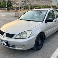 لانسر ٢٠٠٨ • ١.٣ اوتوماتيك • سند ٢٠٣٠