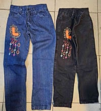 بنطال جنز بناتي • ٣–١٢ سنة • ١٠٠٠ قطعة