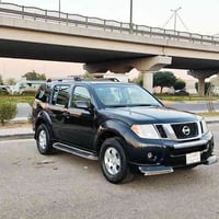 للبيع نيسان بافندر سعر    92  موديل 2009 مكفوله  من ضربه رقم بغداد تحك...