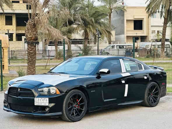 السلام عليكم دوج جارجر مديل 2014 اصل وارد امريكي كلين بدون حادث وصور امريكة مرفوقة بل منشور  موصفات لسيارة فول موصفات ماعدة لفتحة بصمة داخل احمر جلد شاشة جبيرة ويل 20 مكينة 5700 منضومة مال غاز يعني انسة لصرف منضومة زنون اصلية لسيارة ماشية 130 الف وسعر لسيارة 133$ وبيهة 
مجال مكان لسيارة بغداد البلديات 
وهاذ رقمي ***********
