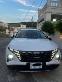 تۆکسۆن مۆدێل ٢٠٢٢ ، مەنەفێست ئەسلی لەسەر ساغە کراوەتە پارچە ڕەش واتە ب...