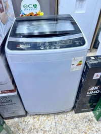 غساله فوال وتماتيك 07721152999 نوعيه شارب ضمان بالماطور عشر سنوات