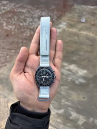 اوميغا سواتش • سبيدماستر • صنع سويسري