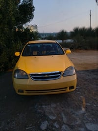 وبركاته سياره سزوكي فورنزا نضيفه وتخم تاير مابيهه اي نقص فقط  ضربه خفي...