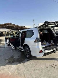 للبيع لكزس ٢٠٢١ كورو ماشيه ٣٦ الف رقم بغداد مغلف سياره  ٠٧٧١١٧٥٨٠٩٥