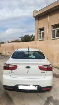 كيا ريو منغولي  موديل 2012  رقم نينوى مسطرة  سيارة  شرط تحويل  طخم تاي...