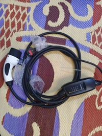 شاحن تيسلا • ٢٥٠فولت • بغداد الشعب