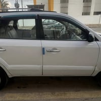 توسان ٢٠١٠ • ابيض • محرك وكير جاهز