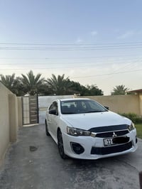 لانسر قرش 2017 مكينه 2000 ماشيه 76 ميل  حادث امريكا البنيد فقط مبدل بد...