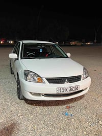 السلام وعليكم لانسر 2002 محدثة 2010 مكينه 1500كير عادي  رقم بغداد دولي...