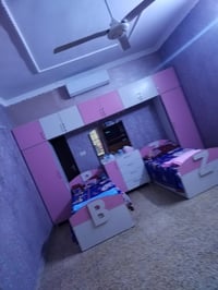 غرفة نوم • سرير • خزان