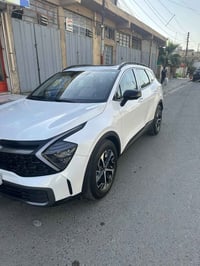 سبورتاج هايبرد 2024 ماشية 22 الف  السيارة فول للاخير كل الموصفات بيه  ...