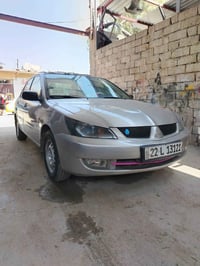 لانسر ٢٠٠٩ • كير توماتيك • رقم اربيل