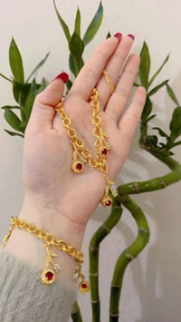 طقم • سوار • قلادة