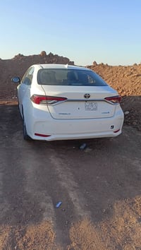 كورلا هايبرد موديل 23 وارد الضفه مو تجميع صيني  رقم بغداد بأسمي  ماشيه...