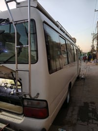 كوستر • رقم بغداد انكليزي • اي بي اس