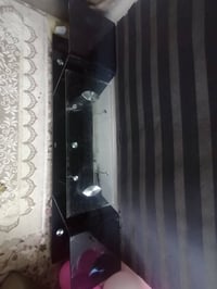 طاولة تلفزيون • ثاني عادي • قابلة تفاوض