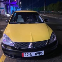 مسيبوشي لانسر موديل 2009مكينة كيرتخم تاير صدر جديد تبريد دوشمةسياره جد...