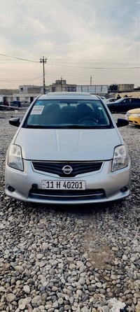 نيسان سنترا • ٢٠١٠ • رقم بغداد