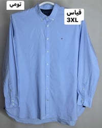 قميص (تومي )سوبر كريم القياس  XXXL  النظافه 💯/💯    يوجد توصيل 🚚 (بغداد...