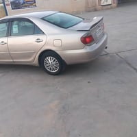 سياره للبيع نوع كامري موديل 2003 خليجي رقم بغداد بسمي دولي  مكينته ارب...
