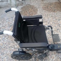 كرسي كهربائي • مكان البلديات • مجال قليل