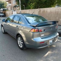 للبيع لانسر 2016 خليجي استلام شركه 2023 ماشيه 44 الف فقط رقم بغداد بأس...