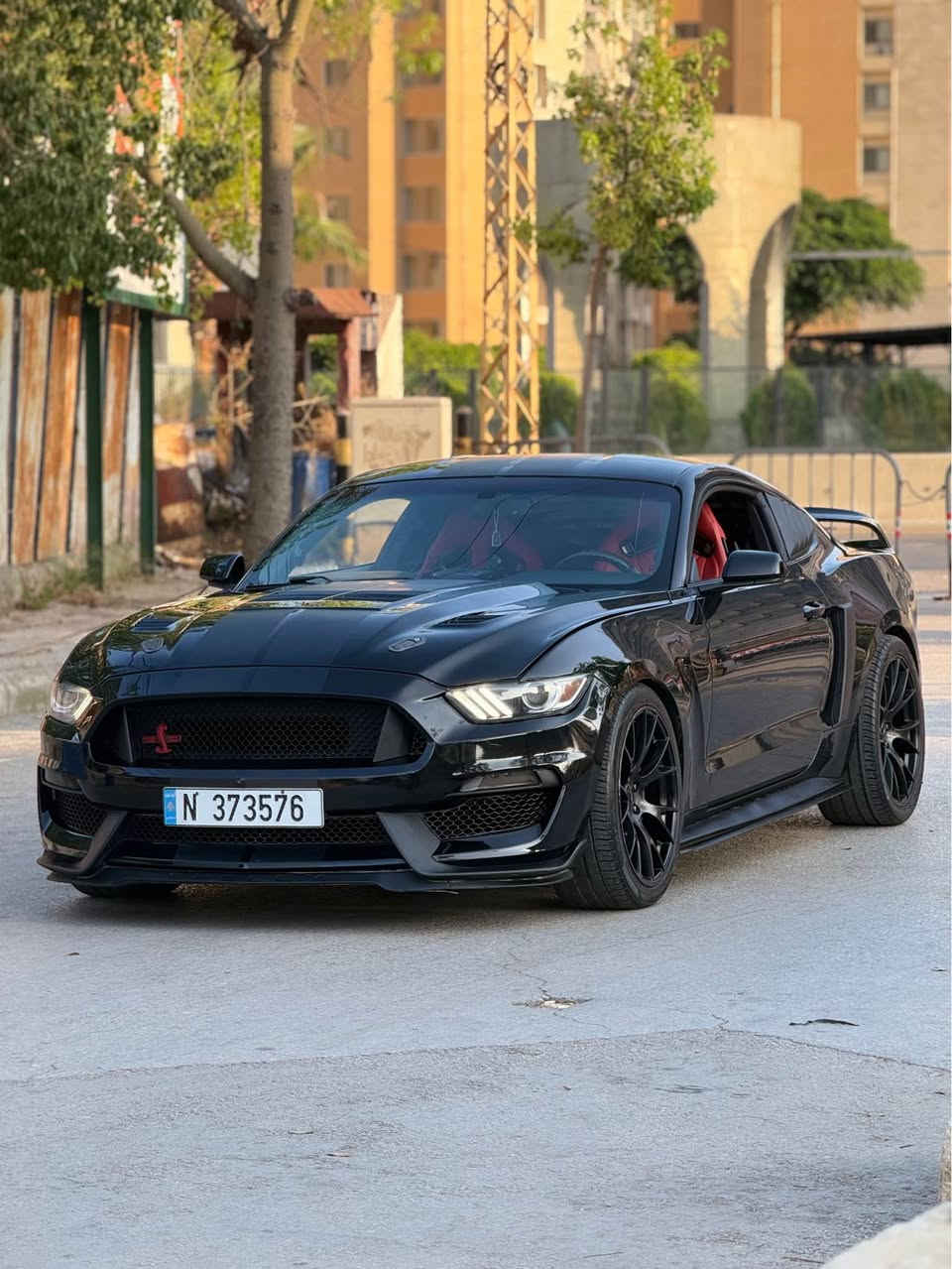 FORD MUSTANG GT 5.0 🐎🚀
MODEL 2015 🔥
UAE SOURCE 🇦🇪
79,000 KM ONLYY 🔥 
BLACK 🖤/ RED ❤️
5.0L COYOTE V8🔥🚀
REAR WHEEL DRIVE 🔥
AROUND 470 HORSE POWER 🐎 

🔥 Exterior (GT350 Full Conversion Style)‼️
• Shelby GT350 front bumper🔥
• Shelby GT350 track pack hood🔥
• Shelby GT350 fenders🔥
• Shelby GT350 rear bumper & diffuser🔥
• Shelby GT350 R rear spoiler🔥
• MMD rear & side louvers🔥
• Raxiom rear 4th brake light🔥
• Raxiom side markers🔥
• Euro style LED tail lights🔥
• 20” performance wheels + tires🔥

Interior Upgrades‼️🔥
• Full carbon fiber interior trim🔥
• Ford limited edition Recaro seats🔥
• Carbon fiber racing steering wheel🔥
• Paddle shifter extensions🔥
• 10” Tesla-style touchscreen🔥

Performance Upgrades‼️🔥
• JLT cold air intake🔥
• Stainless Works long tube headers🔥
• Full Roush exhaust system (quad tips)🔥
• Palm Beach dyno tune🔥
• ECU optimized setup🔥
PRICE:18,500$🔥🔥
📞81/615/449📞
Mwjude beirut ein lromene الشياح, بعبدا


**إذا كنت صاحب هذا الإعلان وتريد حذفه لأي سبب، رجاءا أرسل رسالة إلى الدعم الفني**