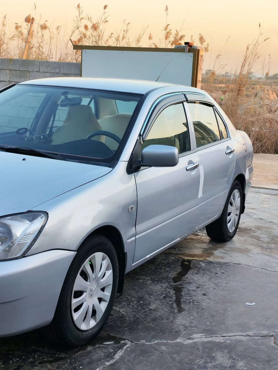 لانسر موديل 2010 ديالى مشروع وطني  مكفولة عدى قطعتين صبغ اثر كلير كير مكينة خير من الله المكينة ٢٠٠٠ صدر امامي خلفي كلة جديد تخم تاير جديد السيارة ماناقصهة اي شي شرط عالسونار مكاني بغداد تحويل ثاني يوم عارضهة 82 وبيهة مجال .رقم صاحب السيارة *********** مكلف بالنشر
