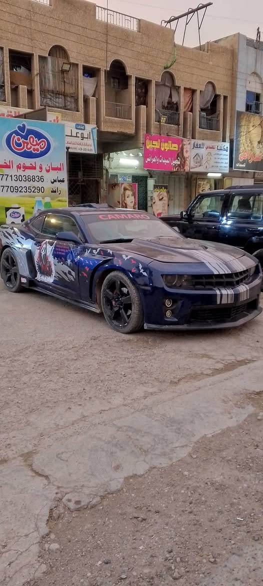 كمارو 2012 فول مواصفات عدا الفتحه سيار امزودا محرك كير صدر تبريد كامله تخم تايرات جديد جاهزا من كلشي رقم بغداد بسمي بجم زنون سيار مصبوغه احزام للجماليه على مود التزويد وعدي فيديو قبل لاتنصبغ بيبان فتحه كامله وتعليك كامرا بلاديه خلفيه وحساسات سعرها 90 وبيها مجال للشراي مكان بغداد حي اور *********** اذا اكو امراوس هم عادي
