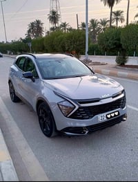 كيا سبورتاج. خليجي – موديل 2024 – رقم أربيل لون أسمنتي بانوراما فول أو...