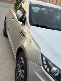 أوبتيما  للبيع موديل 2013 أمريكي  رقم بغداد. باسمي سنويه ل29  ضرر تبدي...