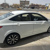 اكسنت • ٢٠١٥ • رقم بغداد
