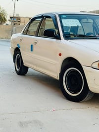 بروتون 2002 السياره نضيفه  رقم بغداد بسمي  السعر 35 ورقه  07714194900