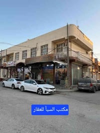 للبيع ... بناية تجارية ... الجامعة ... مباشر على شارع 20 ... ركنية ......