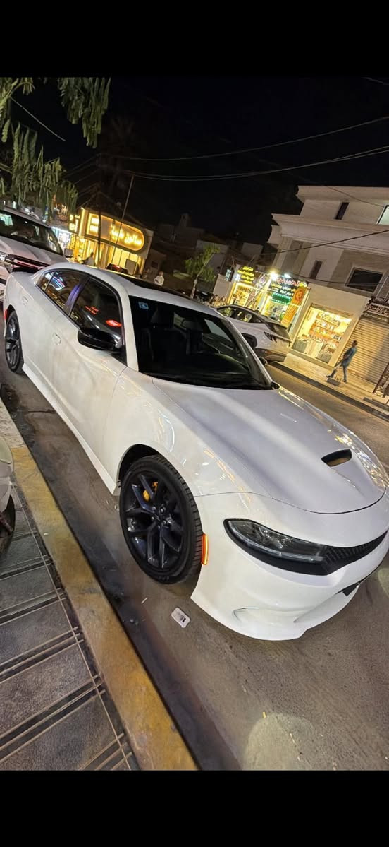 جارجر جي تي بلص بلاك أدشن
فول 1 /1 رادار جانبي مغلفة ppf
‏CHARGER GT BLACK EDITION 
لون  ابيض اخر اصدار لاست كول 
الموديل :2023 . (خليجي)  النداء الاخير. وكاله هارلم 
العداد : 19ميل سياره بعده بحالت زيرو  
الضمان : 3 سنوات او 60 الف كيلو متر . 
المحرك : V6.  3.6L
مكفوله من الصبغ و التبديل و البارد و الشخوط 
مرقم بغداد الجديد كامل تحويل ثاني يوم 
المواصفات : رادار جانبي…….
* جناح خلفي اسود. 
* ويل قياس 20 انچ اسود . 
* مقود القيادة رياضي . 
* مقاعد رياضية من الشاموا الأسود.
* نقطة عمياء . 
رادار جانبي.
* مصابيح أمامية زنون . 
* كشافات الضباب زنون . 
* المصابيح الأمامية مع LED . 
* حساسات خلفية. 
* شاشه كبيرة مع نظام ملاحة نفكيشن GPS . 
* سستم صوت الپاين .
* فتحة سقف (سلايد) . 
* المقاعد الأمامية كهربائية . 
* ذاكرة لحفظ وضعيات الجلوس (ميموري) . 
* مقاعد أمامية تبريد وتدفئة . 
* مقاعد خلفية تدفئة.
* تشغيل عن بعد . 
* المقود كهربائي . 
* تدفئة مقود القيادة . 
* محدد سرعة . 
* تلفون بلوتوث . 
* كاميرا خلفية .
* مرايا متحسسة للاضاءة العالية .
* كير شفتر بالستيرن . 
* دخول ذكي (بصمة) .
بغداد حي جامعه
سعر. 35800
 ***********
***********
