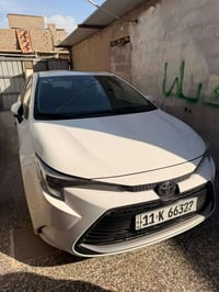 كورلا هايبرد للبيع 2025 ماشيه 10الف مكفوله عدا رصعات 3 بصيطات رقم بغدا...