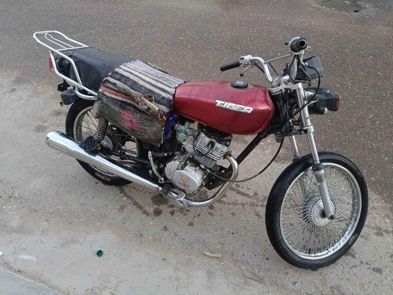 سلام عليكم دراجه للبيع تايكر كامله نقص جوملغ أمامي فقط نفس ما موضح ب صوره موديل 2020 أوراق كامله 
مبدل بيها ولفات غيرها ما مبدل مكان كربلاء حي العامل 
سعرها ٤٠٠ وبيها مجال بسيط لشراي الاستفسار أكثر , ***********
