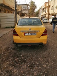 تيدا نيسان 2006 ياباني تكسي بأسمي رقم الجديد بغداد كير اوتو بيها ضربة ...