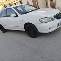 نیسان سەنی  مەکینە سپی چوارجام کارەبایی  گئیر تۆماتیک سه یارەکە بڕاوەی...