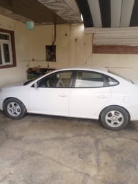 ألنترا 2011 رقم أربيل مكفوله من الصبغ بيها مكانين بارد الرقم 077490590...