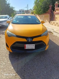كورلا ٢٠١٨ للبيع،،،،،  ضرر.. ( قبغ جنطه فقط) والجامرلغات الاثنين بيهن ...