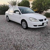 لانسر 2009 رقم ديالئ حرة تحويل مشروع وطني  مكينة 1600 لا صرف ولابخار ق...