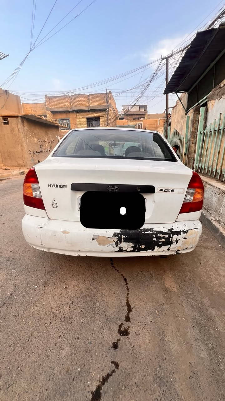 اكسنت مـوديل 2000بغداد خصوصي رقمه انكليزي بااسمي بيه خيط تبخير  السعر38وبيه مجال بسيط رقمي***********
