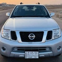 للبيع نيسان بافندر 2009 وارد أمريكي مكفولة من الضربة و التبديل فقط صبغ...