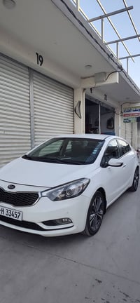 كيا سيراتو 2014 خليجي محرك16 دووش غير مفتوح  كير وتبريد وطخم جديد وشرط...