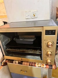 فرن • حجم كبير • باب مكسور